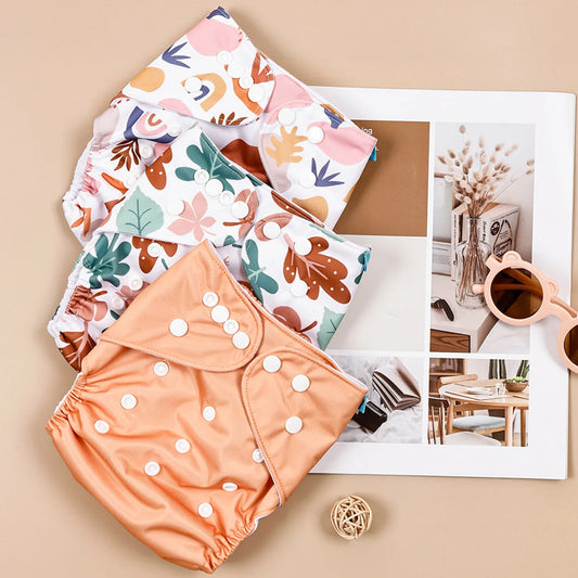 Pieluszka wielorazowa w kolorowe wzory zestaw 3 sztuk Pieluszka wielorazowa w kolorowe wzory zestaw 3 sztuk Pomarańczowy 3-15kg