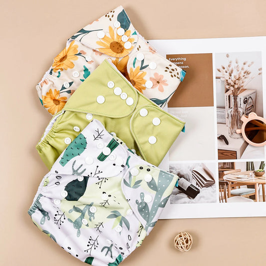 Pieluszka wielorazowa we wzory z roślinami zestaw 3 sztuk Pieluszka wielorazowa we wzory z roślinami zestaw 3 sztuk Zielony 3-15kg