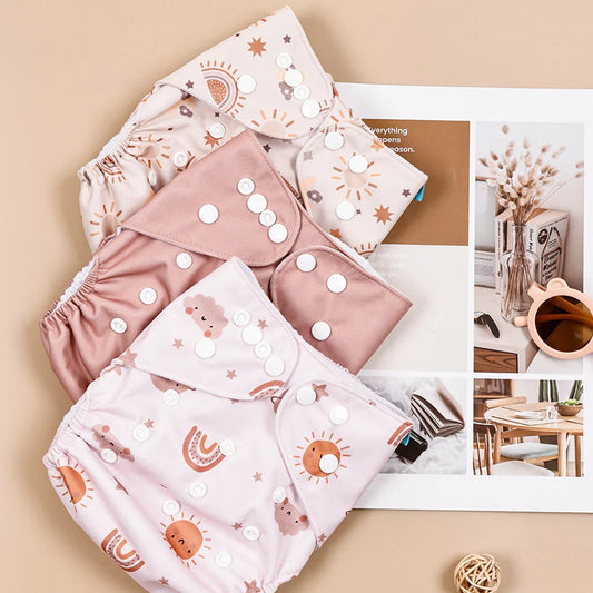 Pieluszka wielorazowa w jasne wzory zestaw 3 sztuk Pieluszka wielorazowa w jasne wzory zestaw 3 sztuk Różowy 3-15kg