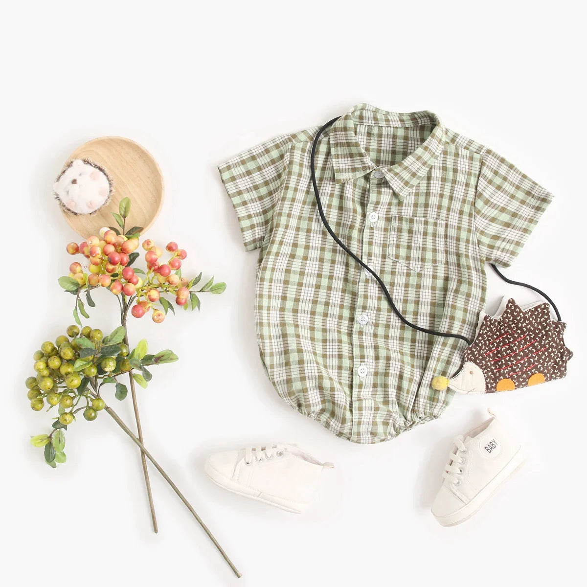 Koszula niemowlęca w formie body w dwukolorową kratę z krótkim rękawem Zielony