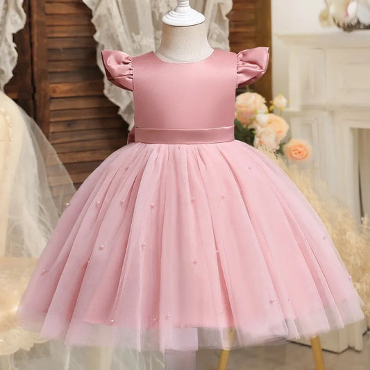 Tiulowa sukienka z satynową kokardą Tiulowa sukienka z satynową kokardą