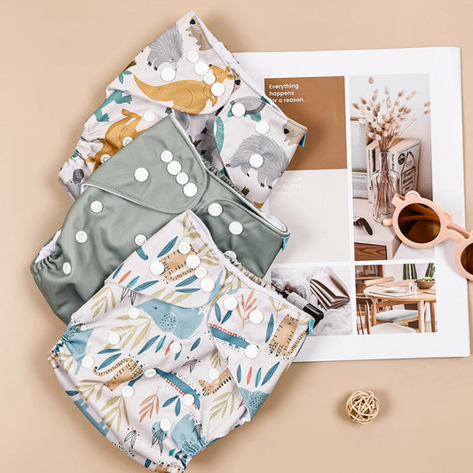 Pieluszka wielorazowa we wzory ze zwierzątkami zestaw 3 sztuk Pieluszka wielorazowa we wzory ze zwierzątkami zestaw 3 sztuk Zielony 3-15kg