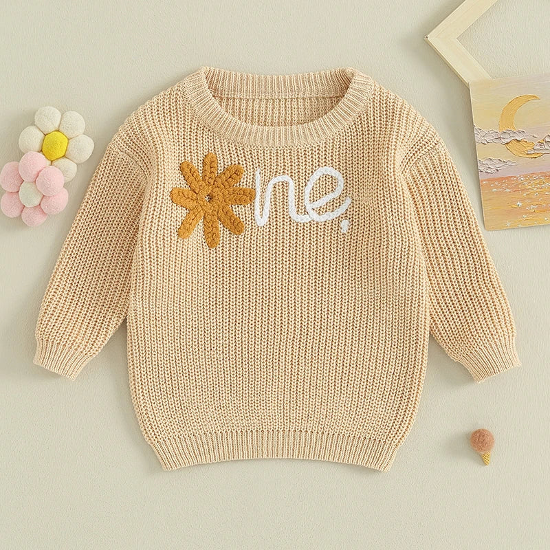 Sweter niemowlęcy z haftowanym kwiatkiem i napisem Sweter niemowlęcy z haftowanym kwiatkiem i napisem Beżowy