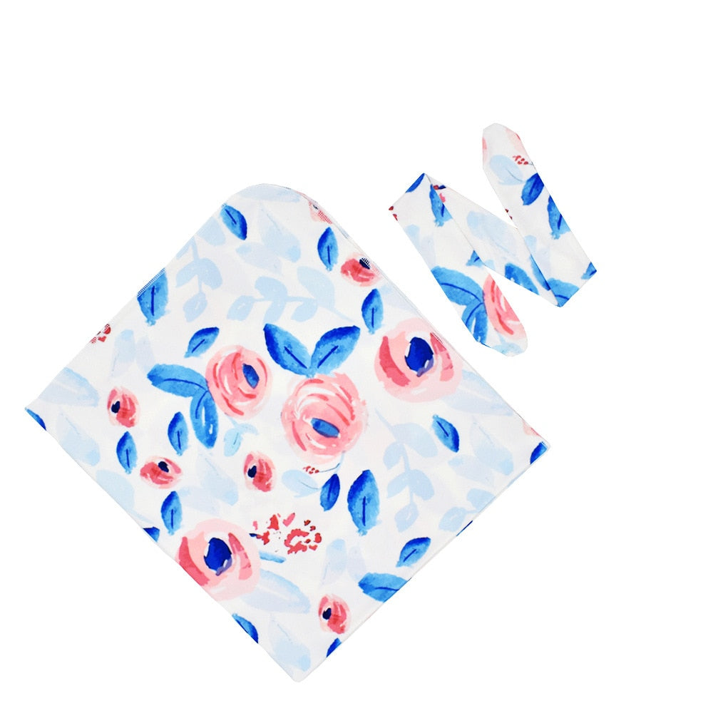 Otulacz dla noworodka we wzory z opaską w zestawie Niebieski