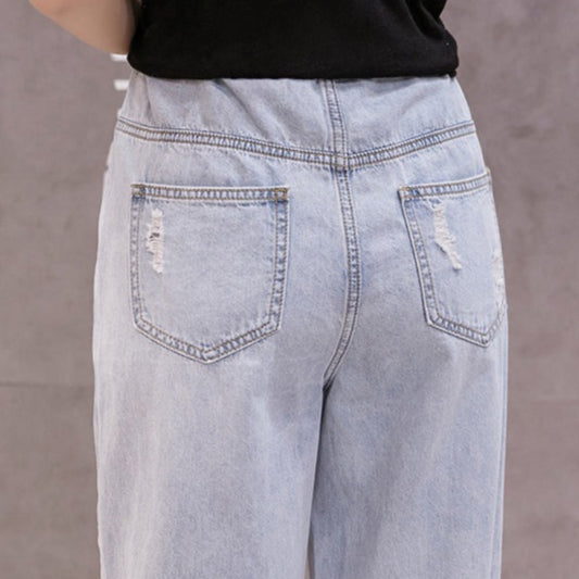Spodnie ciążowe mom jeans z przetarciami Spodnie ciążowe mom jeans z przetarciami