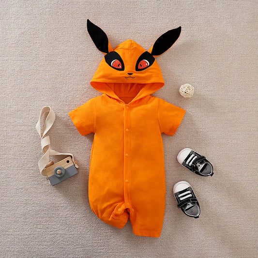 Rampers niemowlęcy z kapturem i motywem z bajki Pokemon Rampers niemowlęcy z kapturem i motywem z bajki Pokemon Pomarańczowy