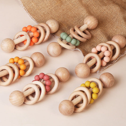 Zabawka drewniana grzechotka z koralikami Zabawka drewniana grzechotka z koralikami