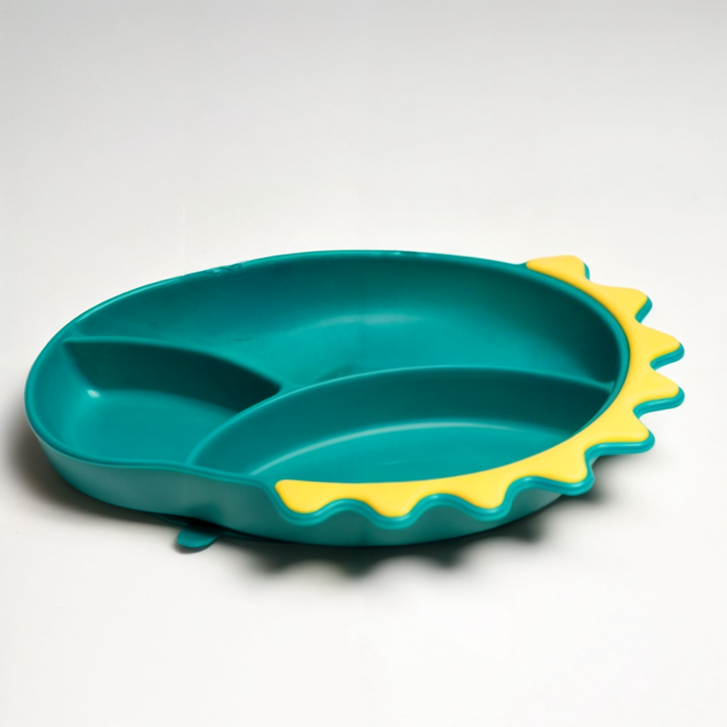 Silikonowy talerzyk w kształcie głowy dinozaura Silikonowy talerzyk w kształcie głowy dinozaura Zielony 22x17cm