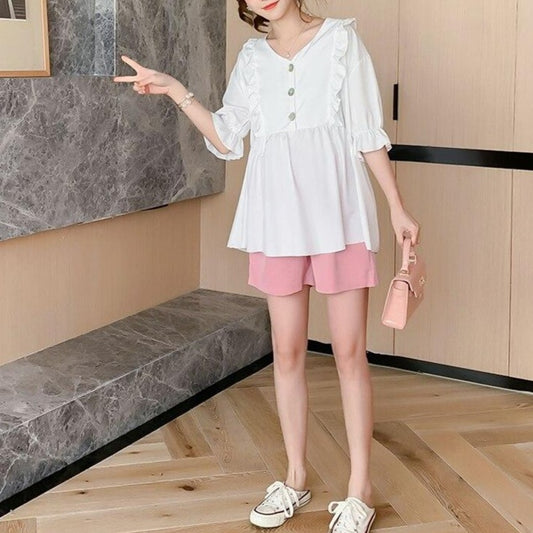 Bluzka dla kobiet w ciąży z falbanką Bluzka dla kobiet w ciąży z falbanką