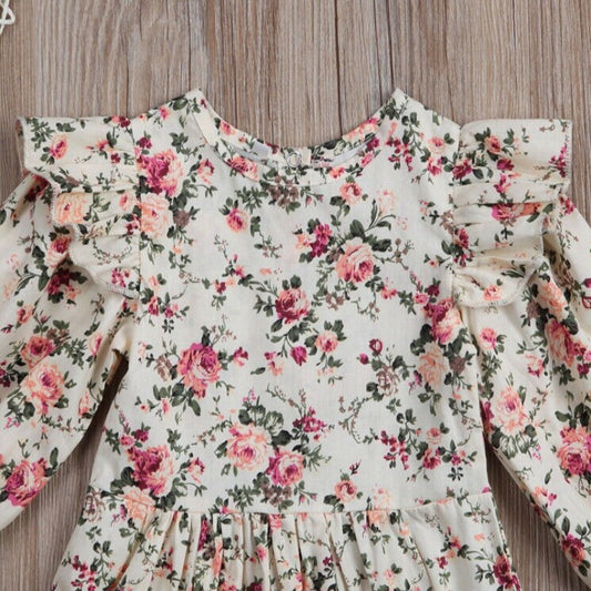 Niemowlęce body z długim rękawem w kwiatuszki Niemowlęce body z długim rękawem w kwiatuszki