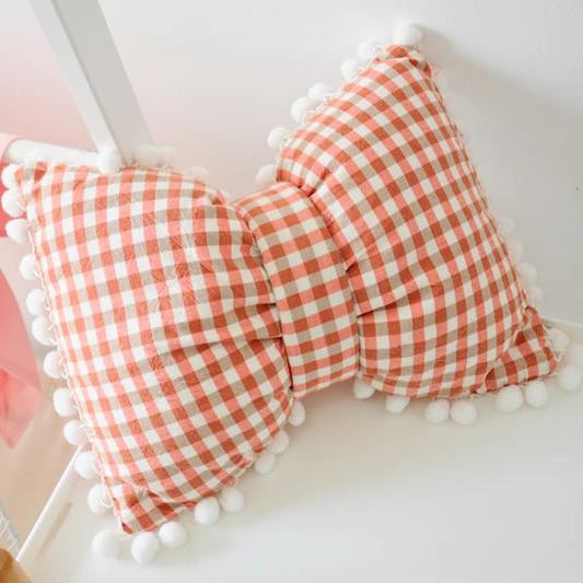 Poduszka dekoracyjna w kształcie muszki Poduszka dekoracyjna w kształcie muszki Pomarańczowa krata