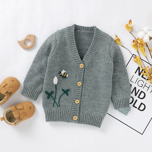 Rozpinany sweterek z haftem w kwiaty Rozpinany sweterek z haftem w kwiaty