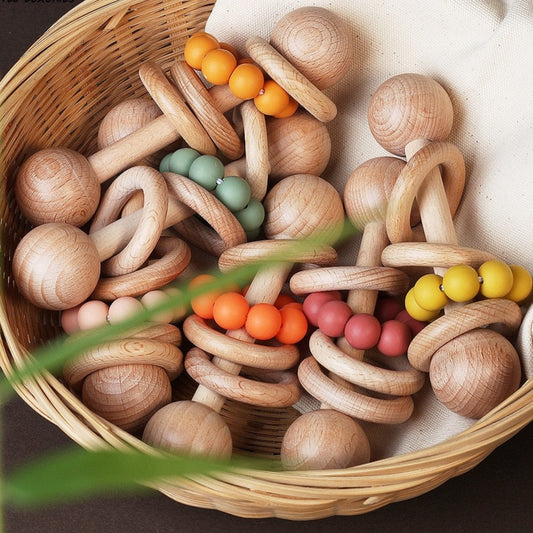 Zabawka drewniana grzechotka z koralikami Zabawka drewniana grzechotka z koralikami