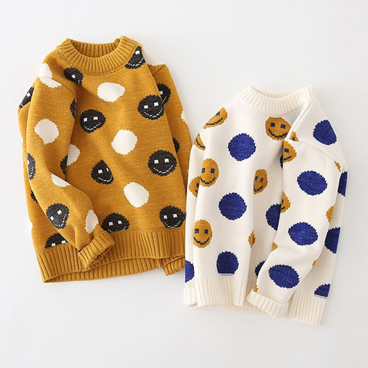 Ciepły sweterek w uśmiechnięte buźki Ciepły sweterek w uśmiechnięte buźki