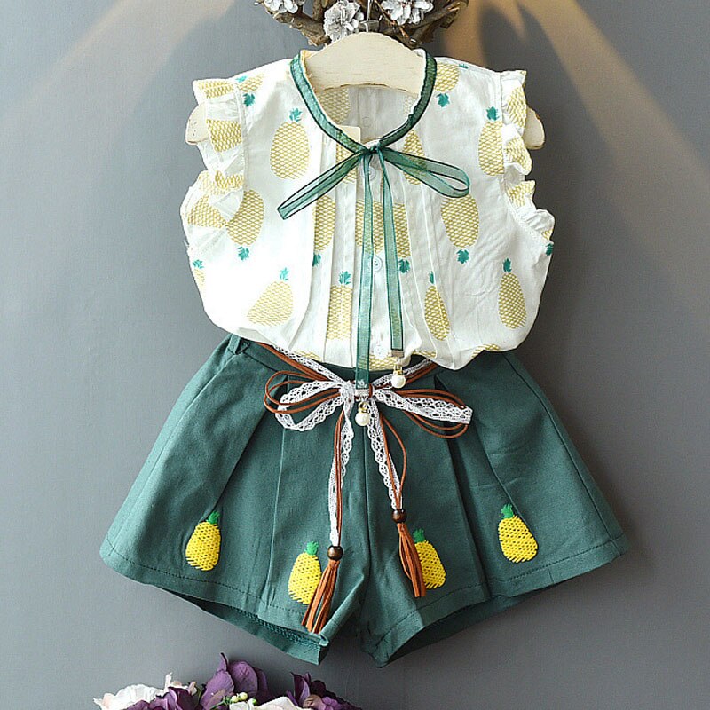 Śliczny dziewczęcy komplet z kokardką i wzorem w ananasy Biało-zielony z kokardką