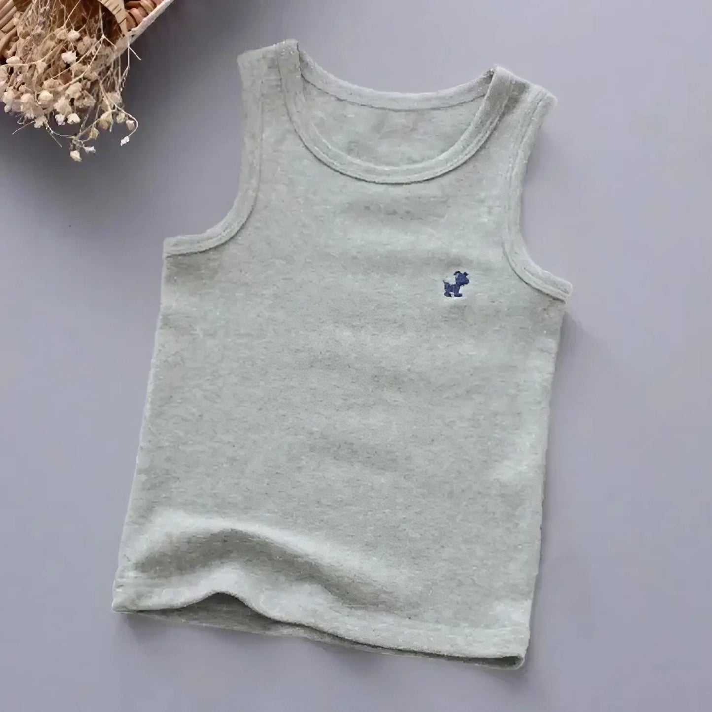 Koszulka dziewczęca na grubych ramiączkach z małym logo pieska - Miziu.pl
