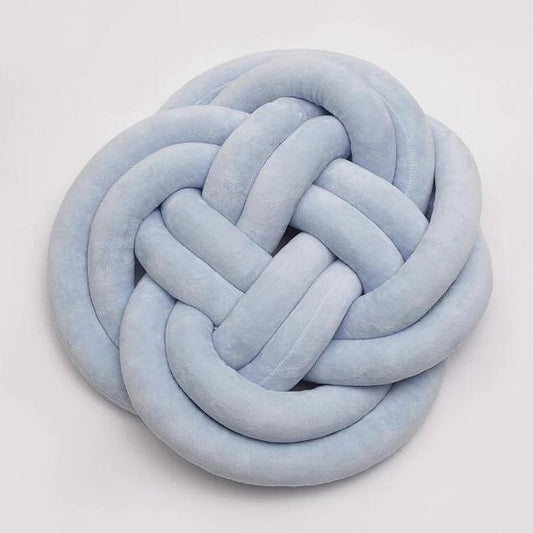 Okrągła poduszka pleciona z warkoczy Okrągła poduszka pleciona z warkoczy