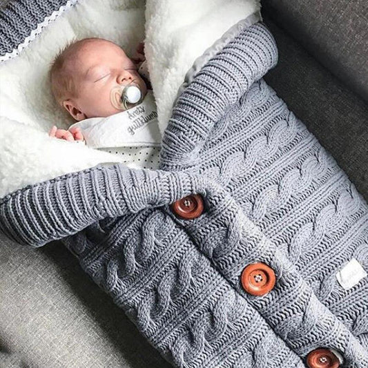 Miękki śpiworek z guzikami do wózka Miękki śpiworek z guzikami do wózka Szary