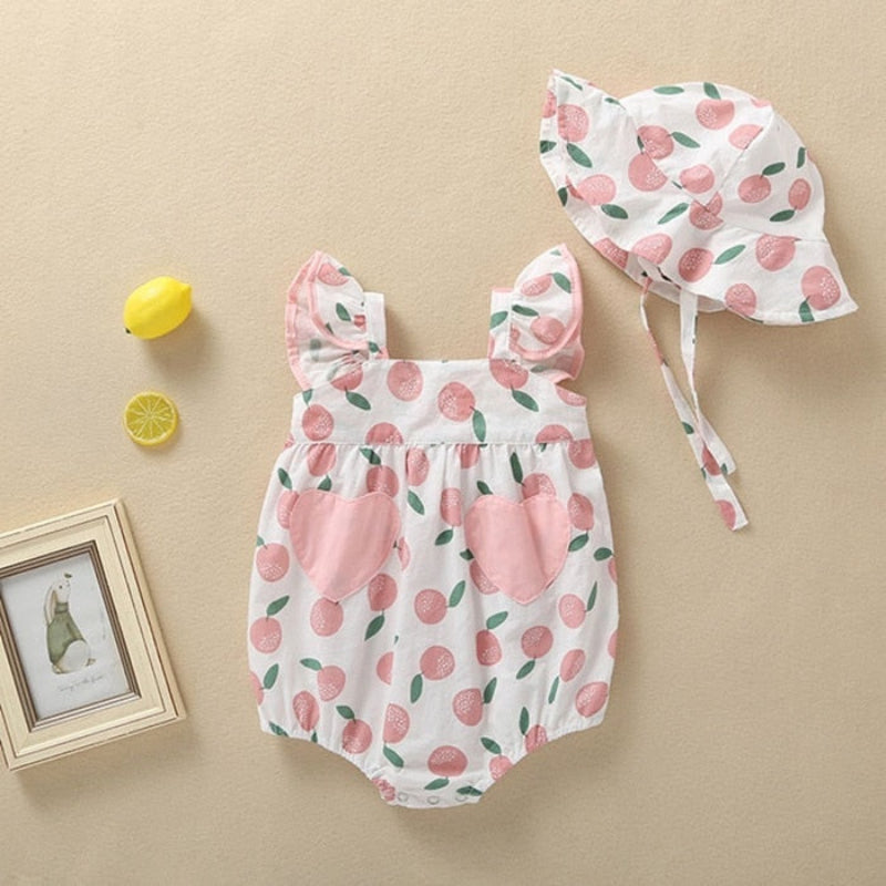 Letnie body z czapeczką w owocowe wzorki Biały z brzoskwinią