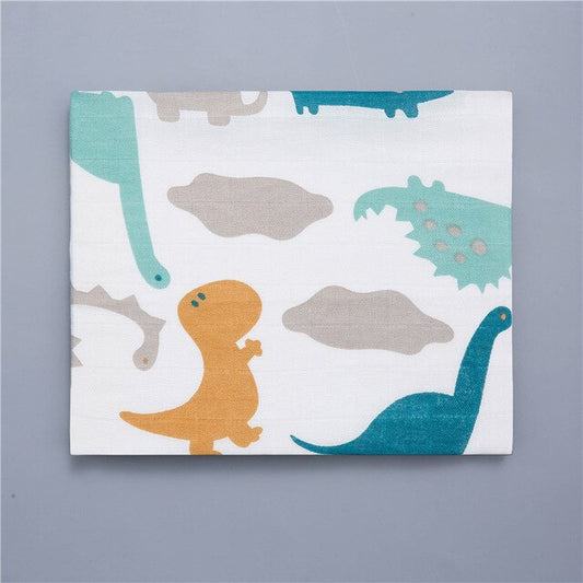 Kocyk otulacz muślinowy 110x110cm Kocyk otulacz muślinowy 110x110cm Dinozaury 1