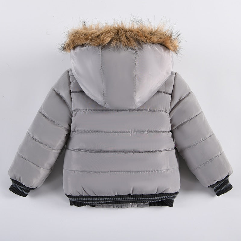 Dziecięca kurtka zimowa pikowana z kapturem z futerkiem - Miziu.pl