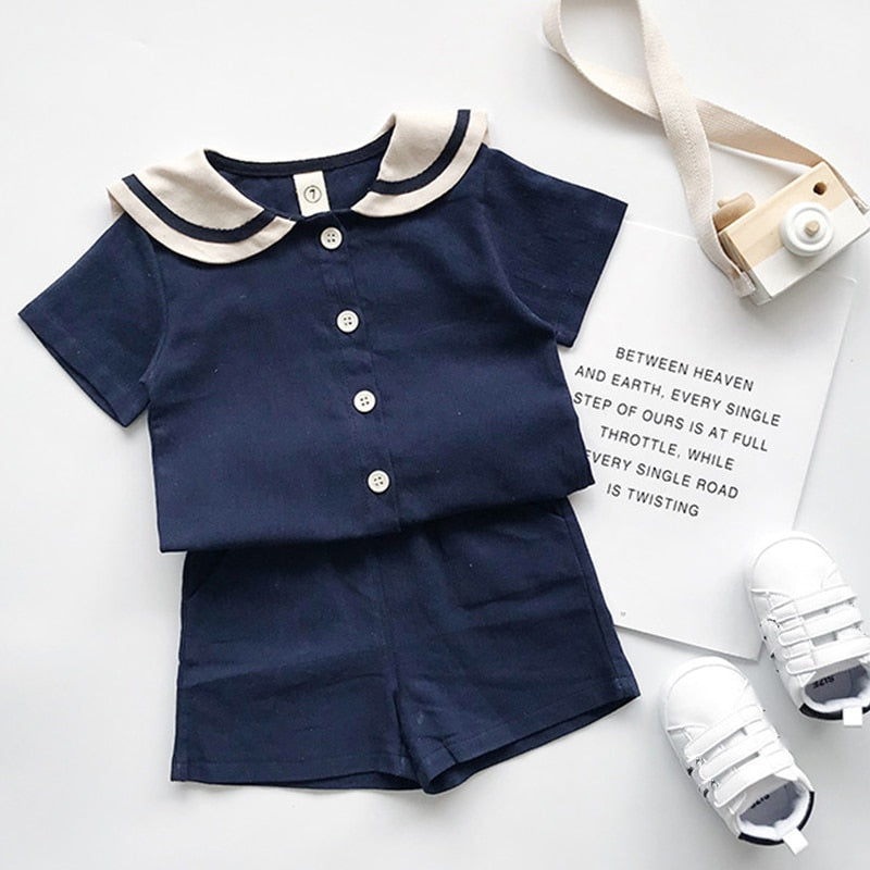Wakacyjny komplet chłopięcy z krótkim rękawem i spodenkami Granatowy z kołnierzem