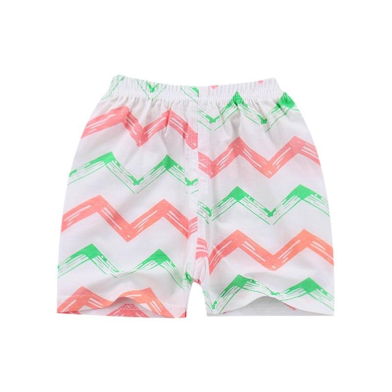 Białe, krótkie spodenki w kolorowe wzorki Białe w kolorowe wzorki