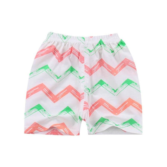 Białe, krótkie spodenki w kolorowe wzorki